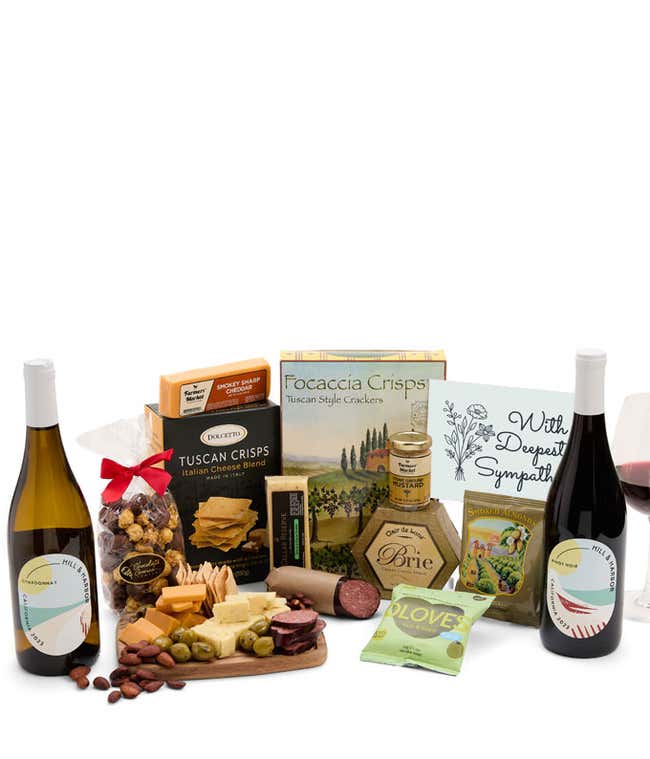 An abundant gift box filled with California Pinot Noir and Chardonnay, assorted crackers, three cheeses, summer sausage, and snacks with a Sympathy Card. 