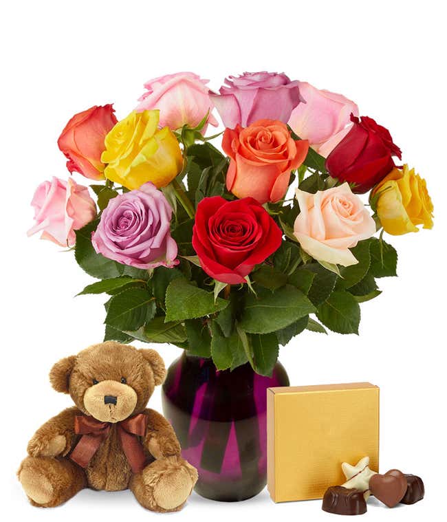 Mixed roses, teddy bear and chocolates
