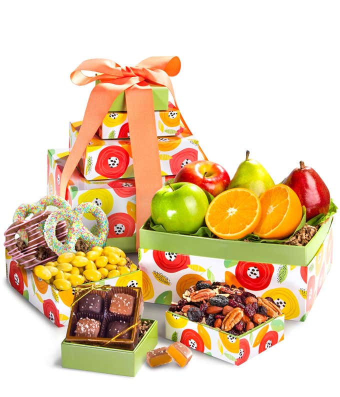 Springtime Gift Tower: Includes Green D'Anjou Pear, Red D'Anjou Pear, Navel Orange, Braeburn Apple, Granny Smith Apple, Gourmet Brownies, Cherry Berry Trail Mix, Lemon Crème Almonds, and Milk & Dark Chocolate Sea Salt Caramels.